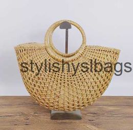 Totes New hollow yellow grass bag moon popular this summer woven ins womens beach H240410