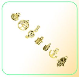 Mixed Designs Retro Golden Color Key Rudder Shell Turtle Bird Hand Tower Bike Butterfly Owl Charms For DIY Jewelry Fitting 50pc4735623