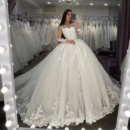 Luxury Ivory Illusion Long Sleeves Wedding Dresses 2024 Princess Lace Appliques Beading Ball Gown Bridal Gowns Vestido De Noiva