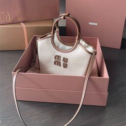 Latest Designer bag Miui new Tote Canvas Spring Summer Large capacity computer Crossbody Clutch bags Stylish and simple Travel bag Grocery basket branded