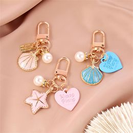 Cute Starfish Keychain Elegant Heart Pearl Keyring for Women Earphone Pendant Bag Ornaments Jewelry Party Gift Accessorie