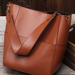 Womens Style Bag in Spring and Summer Leather Wind Cow Bucket One Shoulder Portable Shopping