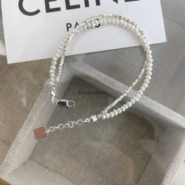 Korean high-end feeling light luxury temperament double-layer entangled broken silver pearl bracelet womens cool and fashionable versatile bracelet