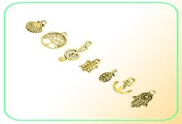 Mixed Designs Retro Golden Colour Key Rudder Shell Turtle Bird Hand Tower Bike Butterfly Owl Charms For DIY Jewellery Fitting 50pc1356966