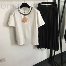 Two Piece Dress designer 2024 Spring/Summer Nanyou New Set Chest Letter Beaded Round Neck Short sleeved T-shirt+High Waist Pleated Half Skirt 1H0S