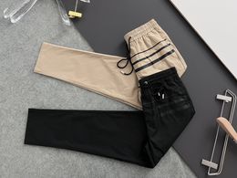 High end brand men's designer sports and leisure trend men's and women's cropped pants black and white running pants fashion elastic waist pants sportswear M-3XL