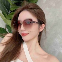 Fashionable cut edge nylon high-definition sunglasses for women frameless square gradient net red same glasses