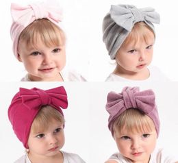 Baby kids double knitting hat autumn winter new children cashmere Bows hats newborn soft hats baby girls warm Beanies 12 colors A23234547