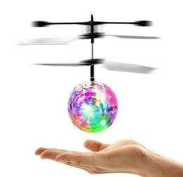 new Flying RC Ball Aircraft Helicopter Led Flashing Light Up Toy Induction Toy Electric Toy Drone For Kids Children c0441993655