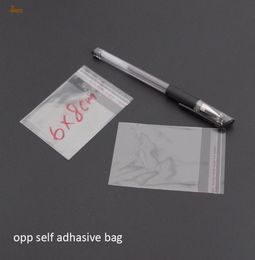 promotion real 1000pcs clear resealable bopp poly cellophane bag 6x8cm transparent opp gift bags plastic packaging self adhesive s4781575