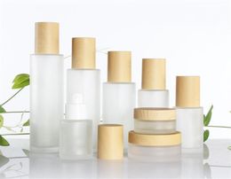 Frosted Glass Bottle Cream Jar with Imitated Wood Lid Lotion Spray Pump Bottles Portable Cosmetic Container Jars 20ml 30ml 40ml 507193435