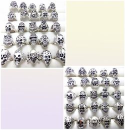 Whole bulk lot 100pcs Styles Top Mix Skull Rings Skeleton Jewelry Men039s Gift Party Favor Men Biker Rings man jewelry BRAND 6394270