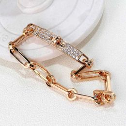 H bracelet Jewelry Kelly Bracelet micro inlaid gold-plated simple cool wind twist buckle switch womens hand ornament