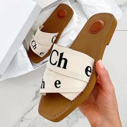 Designer sandals Women's wooden slippers Flat canvas mule slide Beige white Black Pink lace letters blur fur women's summer outdoor shoes size 35-41