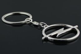 5pcslot Fashion Metal 3D Car Logo Keychain Key Chain Keyring Key Ring Chaveiro Llavero For Opel Auto Pendant Car Accessories Whol8459964