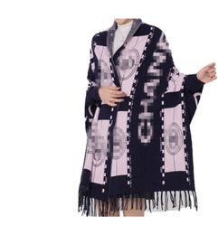 Autumn and winter warm thickened cape cape for women with long sleeve jquard tassel with a cape6782011