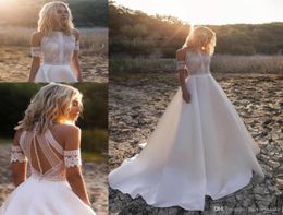 Bohemian Beach ALine Wedding Dresses Lace Applique Jewel Neck Floor Length Pleats Wedding Dress Bridal Gowns Vestido De Novia8207495