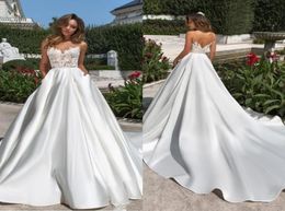 Sheer Mesh Top Satin A Line Wedding Dresses Tulle Lace Applique Court Train Backless Garden Wedding Bridal Gowns With Pockets BC273832487