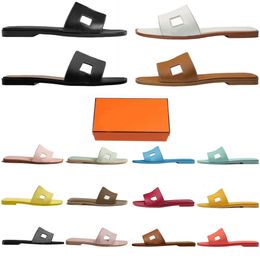 Designer Sandals Donne Slide Slides con in pelle in pelle in gomma Luxurys Summer Lady Beach Classic Flat Sandal