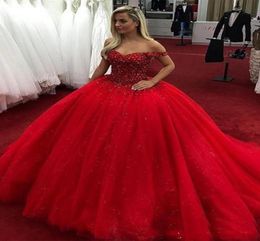 2018 Bling Quinceanera Ball Gown Dresses Off Shoulder Beaded Crystal Sweet 16 Arabic Long Tulle Puffy Plus Size Party Prom Evening4981174