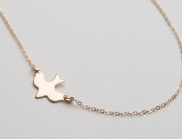 10PCS N107 Gold Silver Tiny Soar Flying Bird Necklace Peace Dove Necklace Little llow Baby Bird Necklaces Abstract Necklaces6829003