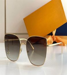 Designer Cheap classic Luxury charm cat eye sunglasses for women avantgarde metal pendant glasses summer elegant glamorous style5949708