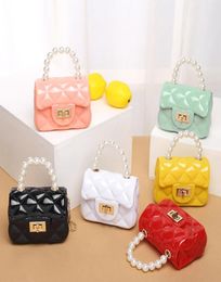 2021 Kids New Pearl PVC Portable Mini Candy Colour Small Jelly Bag Fashion Casual Small Change Bag8752080