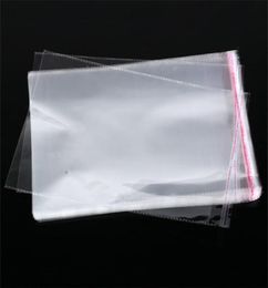 100pcsLots Resealable Cellophane OPP Poly Bags Thick Clear Chlothes Clothing Package Storage Bag Envelope Gift Wrap1320176