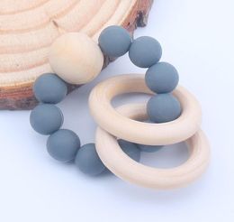 Natural Wooden Ring Teethers for Baby Mini Size Health Care Accessories Infant Fingers Exercise Toys Colourful Silicon Beaded Sooth3555074