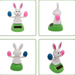 Car Creative Bunny Holding Eggs Solar Dashboard Toy Auto Solar Dancing Figurines Automobile interior Decorative Accessories