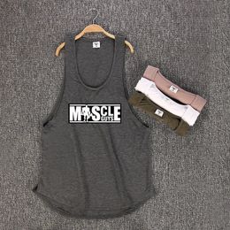 Muscleguys Brand Bodybuilding Sleeveless Shirt Mens Gyms Tank Top Low Cut Vest Sexy Muscle Fitness Stringer sportwear Undershirt 240412