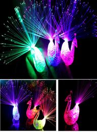 HaoXin Colorful Luminous Toys Peacock Finger LED Lightup Ring Party Rave Favors Gadgets Intelligent Toy For Kids Girls4288257