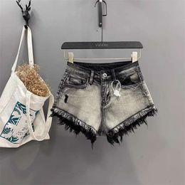 Sexy A-line black Super Shorts for hot girl Fashionable Heavy Industry Tassels Ragged Edges Stretch Wrapped Hips Cowboy Hot Pants Trendy