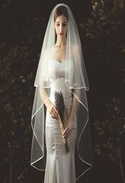 Elegant Bridal Veils Bride Veil Fingertip Length TwoLayer Simple Handmade Noble Tulle Ribbon Edge Wedding Veil Headwear Comb1831161
