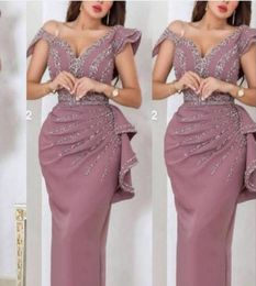 2022 Sexy Dusty Pink Arabic Dubai Prom Dresses Off Shoulder Silver Crystal Beads Cap Sleeves Plus Size Party Evening Gowns Wear Sh7014924