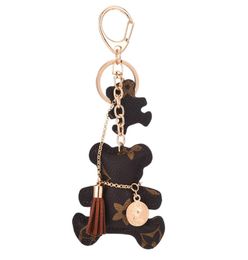 Party gift creative personality bear leather keychain female cute leather horseshoe buckle car key chain couple bag pendant7424821