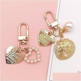 Keychains & Lanyards Cute Pearl Shell Keychain Ins Metal Jewellery Keyring Accessories Creative Small Gift Bag Pendant Drop Delivery Fa Dhbre