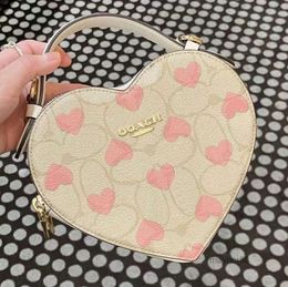2024 Womens mens black white sacoche heart bag strap Leather purse Luxurys handbag pink Designer Shoulder top handle strawberry CrossBody Clutch denim city tote
