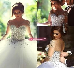 Sheer Tulle Ball Gown Wedding Dresses 2020 with Illusion Long Sleeves Crew Neck Lace Up Back Sequins Beaded Pearl Pretty Bridal Go5057681