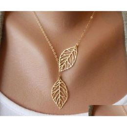 Pendant Necklaces Simple European Vintage Punk Gold Hollow Two Leaf Leaves Necklace Clavicle Chain Charm Jewellery Drop Delivery Pendant Dhf8G