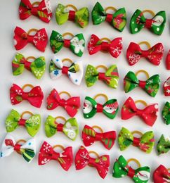 100pcs New Dog Christmas Hair Bows Topknot Small Bowknot with Rubber Bands Pet Grooming Products Mix Colors Pet Dog Xmas Hair Acce4720310