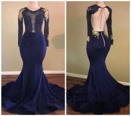 Navy Blue Arabic Long Sleeves Evening Dresses Jewel Sheer Neck Appliques Lace Prom Dresses Mermaid Style Open Back Sexy Party Gown6068979