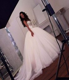 2019 Luxury Long Princess Puffy Wedding Dresses Bridal Ball Gown Crystals Sweetheart Backless Chapel Train Bride Dress Custom Form1725195