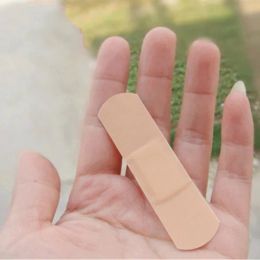 100pcs/lot Portable Waterproof Band Aid Adhesive Bandage First Aid Wound Dressing Tape Anti-Bacteria Wound Plaster Emergency Kit