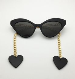 Fashion designer 0978 Sunglasses for women Charming Cat eye frame Heart pendant glasses top quality AntiUltraviolet protection co1948045