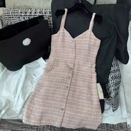 Basic & Casual Dresses designer Spring and Summer New Nanyou Cha Temperament, Age Reducing Sweet Girl Style, Single breasted Slim Fit, Chequered Strap Short Skirt 7NOD