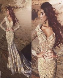 2018 New Arabic Mermaid Long Sleeves Lace Evening Dresses Deep V neck Beads Appliqued Dubai Evening Gowns Vestidos De Fiesta2570714