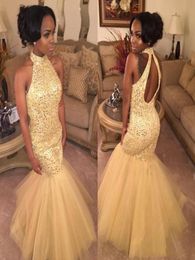 2019 High Neck Puffy Mermaid Cheap Prom Dresses Long Yellow Tulle Bling Sequins Backless Evening Party Major Beading Gown8442577