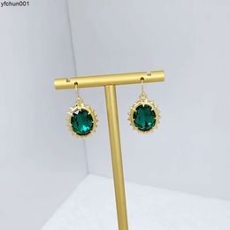 Fenggui Talent Designer Inlaid Green Oval Transparent Fashion Natural Durian Ear Hook