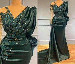 Vintage Arabic Long Sleeve Dark Green Mermaid Evening Dresses Beaded Sequined Appliques Pleats Long Satin Formal Occasion Prom Gow3607440